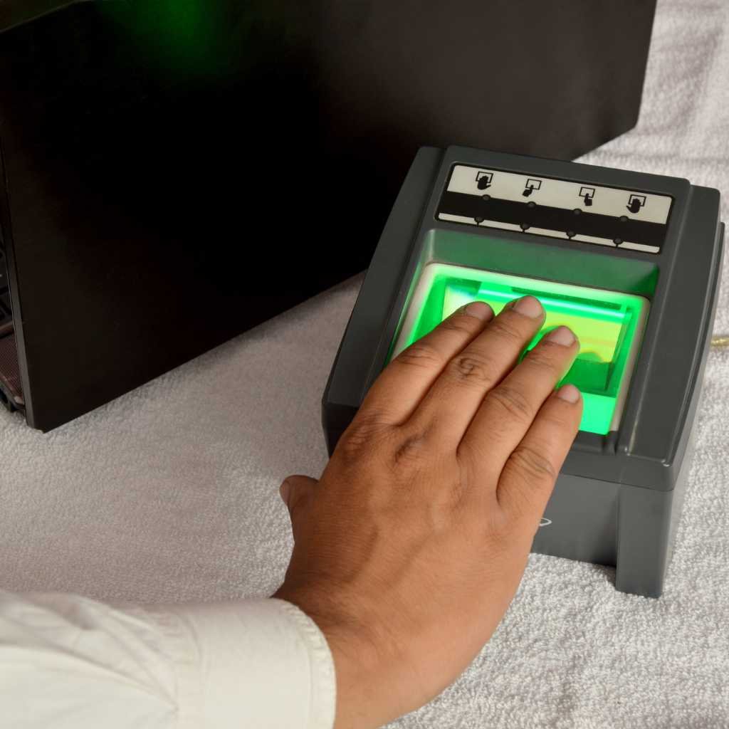 Livescan Fingerprinting Scanner | Miami Beach | Client is being fingerprinted